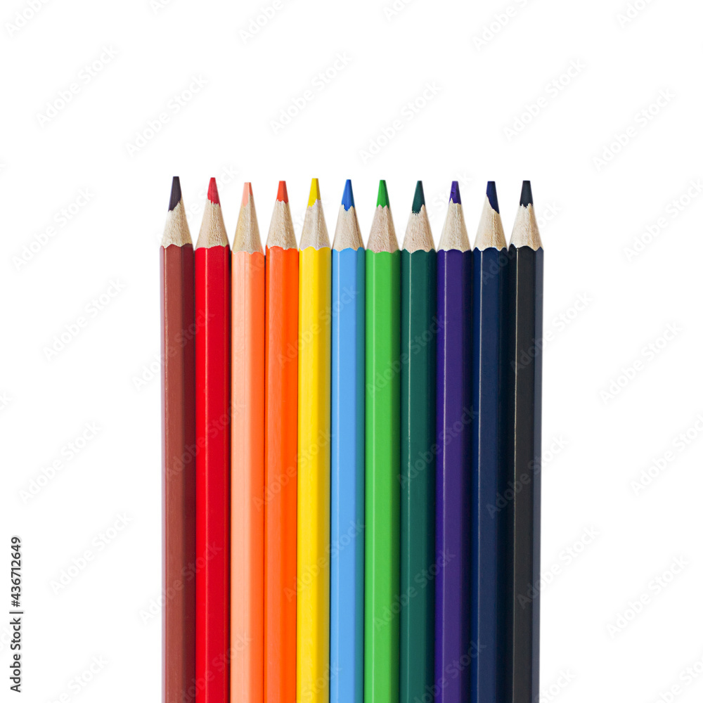 An even row of colored pencils isolate An even row of colored pencils isolate