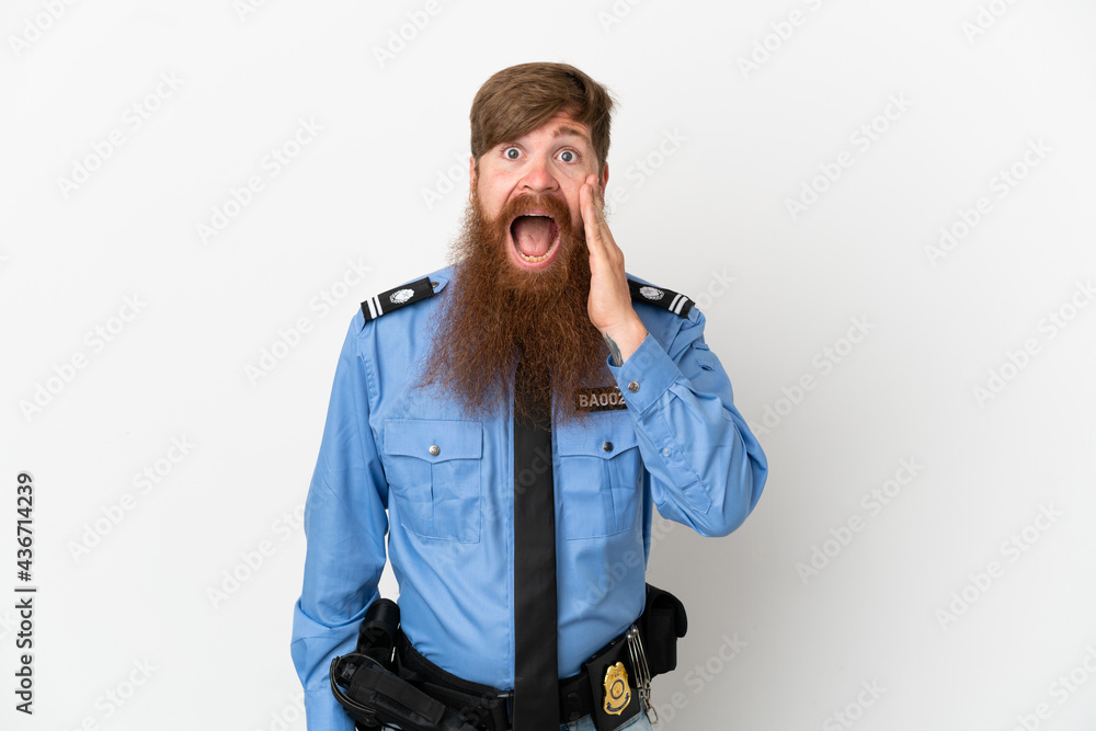 Redhead police man isolated on white background with surprise and shocked facial expression Redhead police man isolated on white background with surprise and shocked facial expression