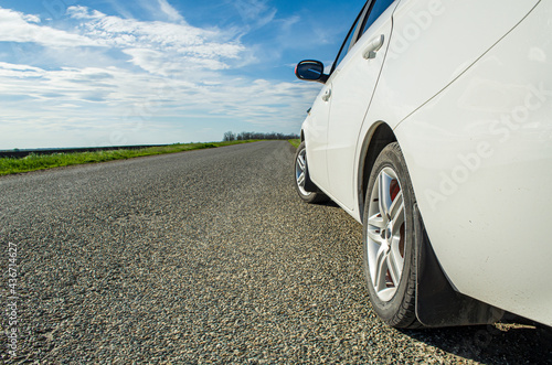 car on the road wheels asphalt grip reliability travel