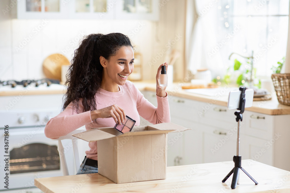 Unboxing Video. Excited Happy Brunette Lady Unpacking Parcel With Cosmetics At Camera Unboxing Video. Excited Happy Brunette Lady Unpacking Parcel With Cosmetics At Camera