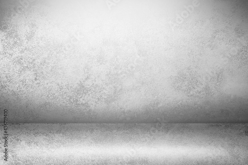 White and gray backgrounds made of cement floor wall backgrounds, empty studio room used for display products ad website template  interior design