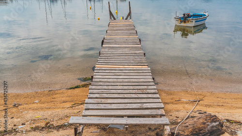wooden pier at beach in Greece