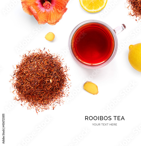 Creative layout made of rooibos tea and lemon on the white background. Flat lay. Food concept. Macro  concept. photo