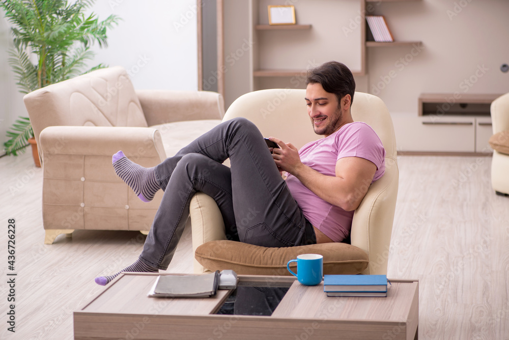 Young man siiting at home during pandemic Young man siiting at home during pandemic