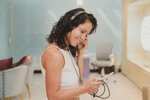 woman listening to music with headphones