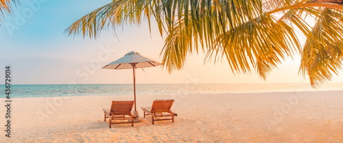 Beautiful beach. Chairs on the sandy beach near the sea. Summer holiday vacation concept for tourism. Inspire panorama tropical landscape. Tranquil scenery, relaxing beach, tropical landscape banner
