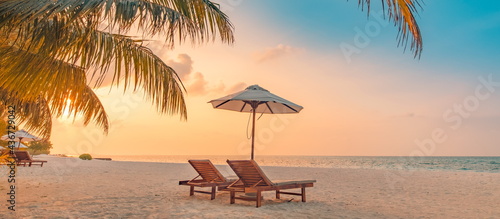 Beautiful beach. Chairs on the sandy beach near the sea. Summer holiday vacation concept for tourism. Inspire panorama tropical landscape. Tranquil scenery  relaxing beach  tropical landscape banner