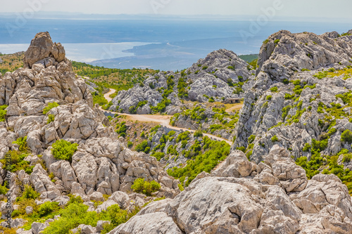 Velebit mountain wild road scene in summer time