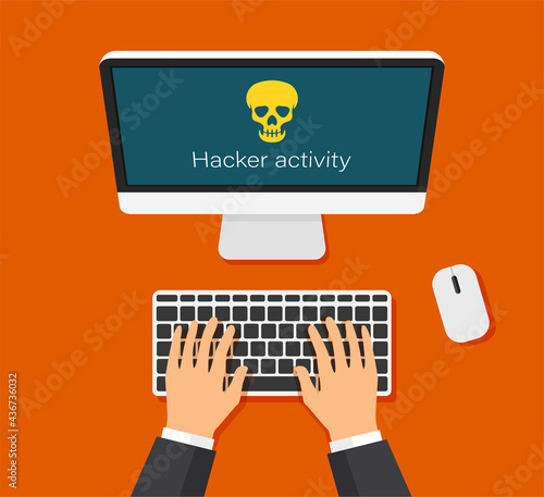 Monitor and virus warning on it. Hacking mail or computer. Hand are typing on keyboard. Skull icon on a display. Getting a pirated or infected letter. Top view.