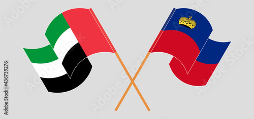 Crossed flags of the United Arab Emirates and Liechtenstein. Official colors. Correct proportion
