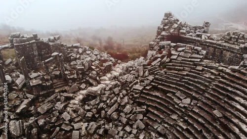 Remains of Roman theatre in ancient city of Sagalassos on misty winter day, Burdur Province, Turkey photo