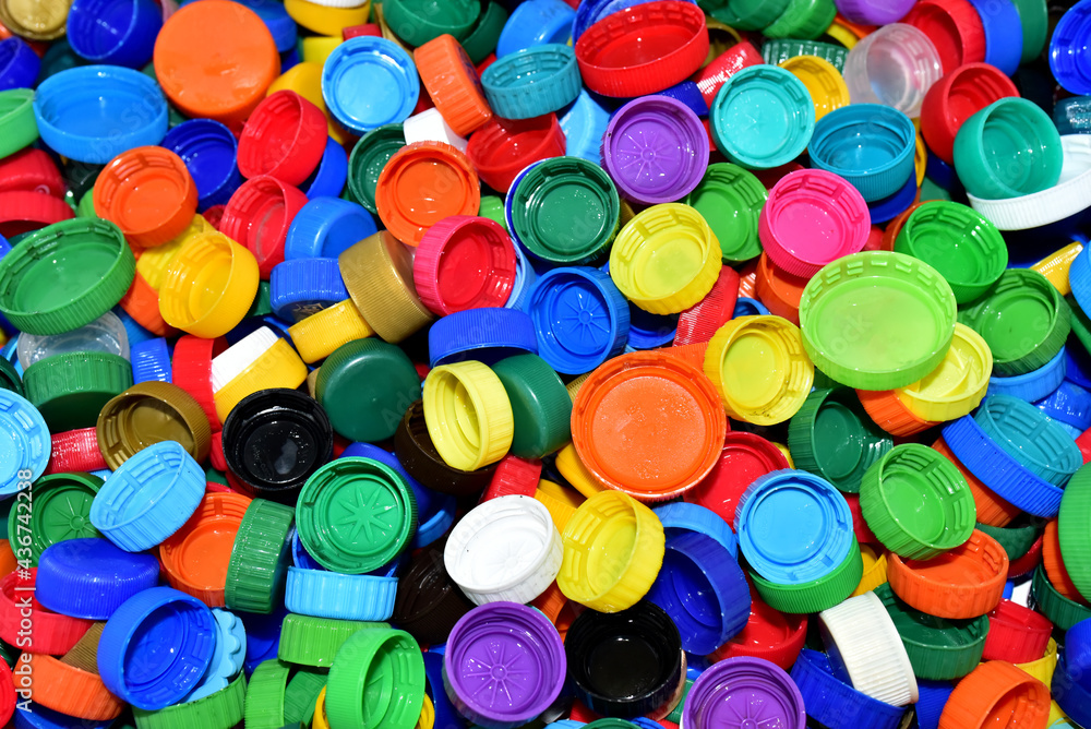 Plastic bottle caps for recycling. Cap material of plastic recyclable materials for recycling