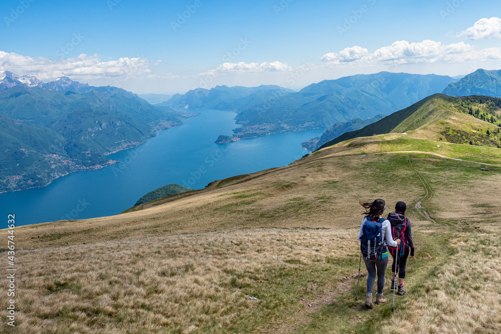 Trekking scene on Lake Como alps