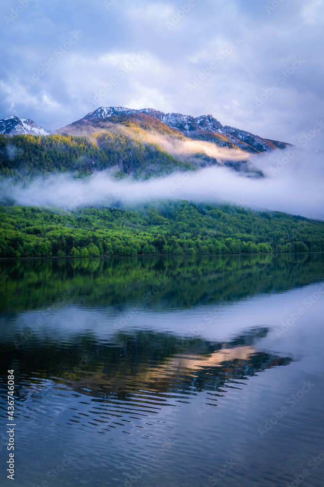 Foggy sunset at the Bohinj Lake in Slovenia. Foggy sunset at the Bohinj Lake in Slovenia.