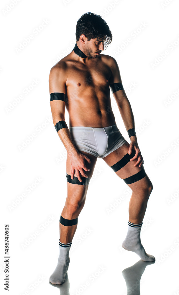Sexual muscular man posing over white background Sexual muscular man posing over white background