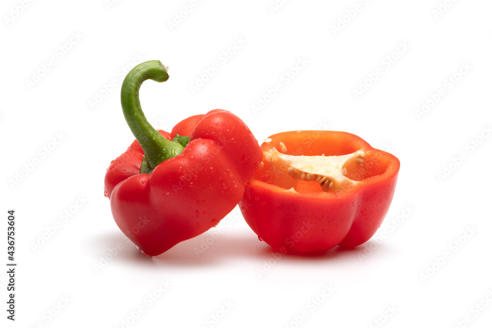 Fotografie Red bell pepper cut in half on white