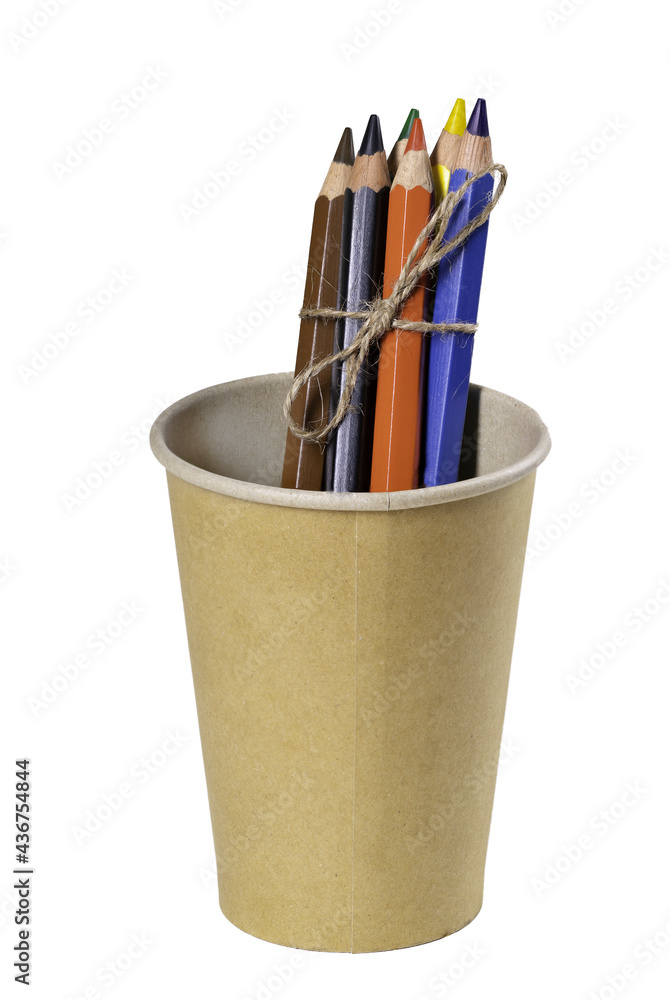 Paper cup with pencil crayons for drawing drawings. Accessories for creating art works. Paper cup with pencil crayons for drawing drawings. Accessories for creating art works.