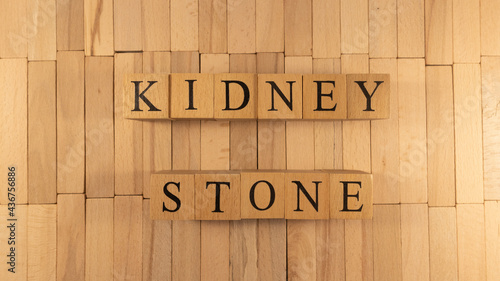 The word kidney stone created from wooden cubes. Health and life