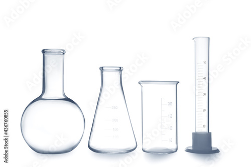 Empty clean laboratory glassware on white background