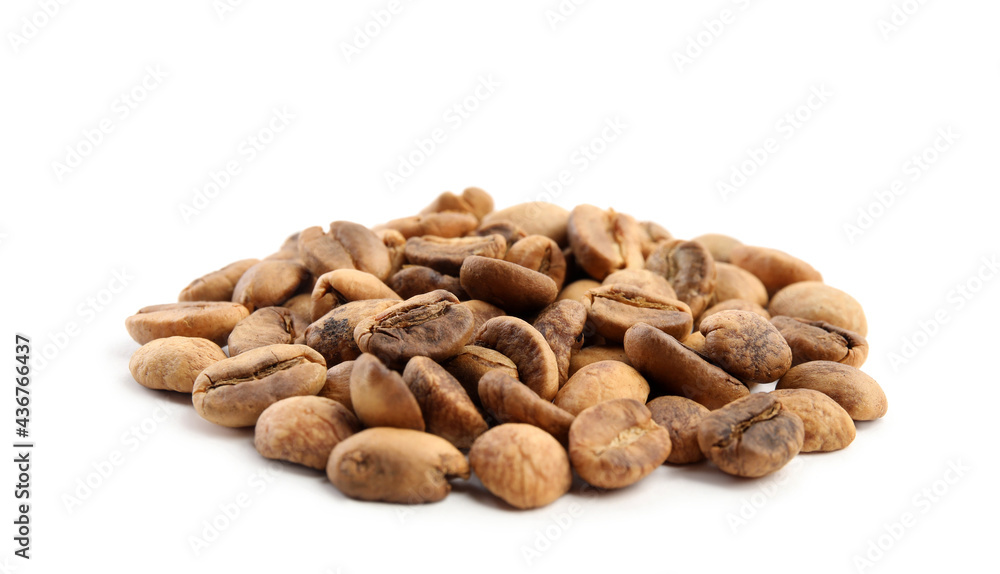 Heap of roasted coffee beans isolated on white Heap of roasted coffee beans isolated on white