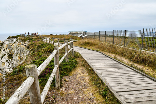 bridge over the river, photo as a background , in playa del silencio , silent beach, principado de asturias, spain europe photo