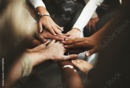 Joined hands for teamwork photo