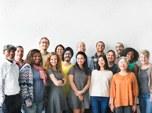 A team of diverse people doing a group photo photo