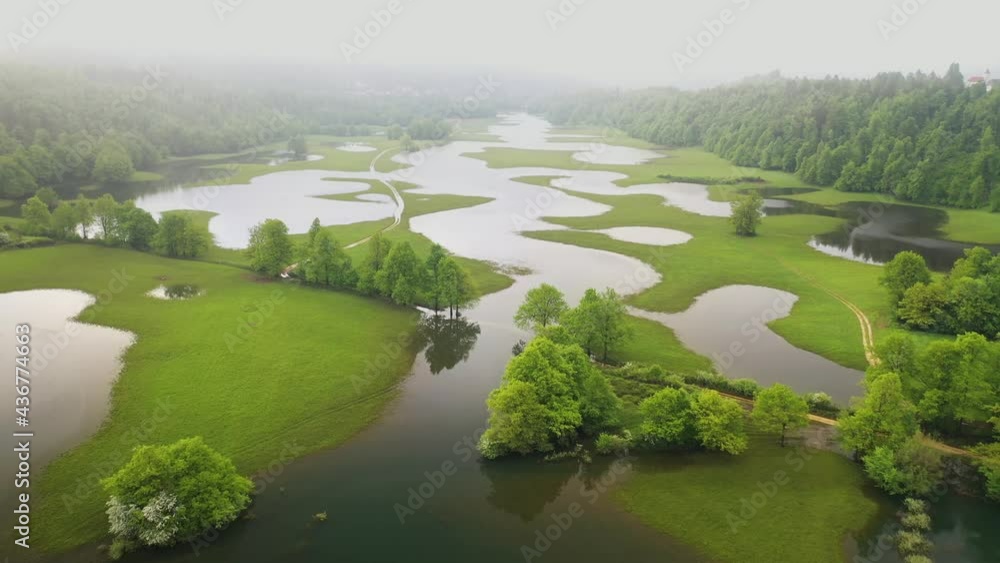 Planinsko polje is a karst field that is often flooded when there is a lot of rain. In the summer it is used as a meadow and a field for farmers. Planinsko polje is a karst field that is often flooded when there is a lot of rain. In the summer it is used as a meadow and a field for farmers.