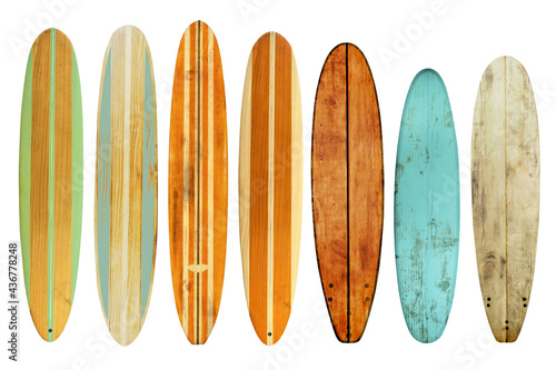 Collection of vintage wooden longboard surfboard isolated on white with clipping path for object, retro styles. © jakkapan