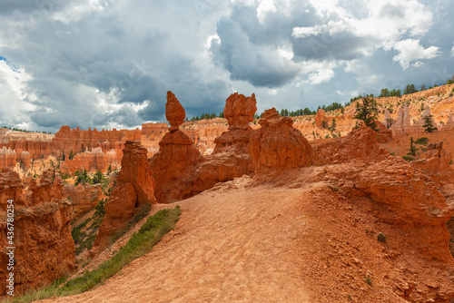 Dramatic thunder clouds above the sandstone hoodoos, Bryce Canyon national park, Utah, United States of America, USA.
