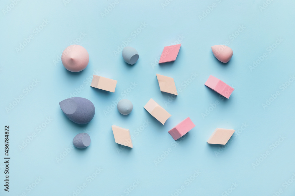Makeup sponges on color background Makeup sponges on color background