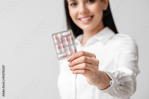 Beautiful young woman with ...