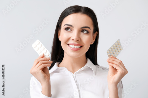 Beautiful young woman with ...