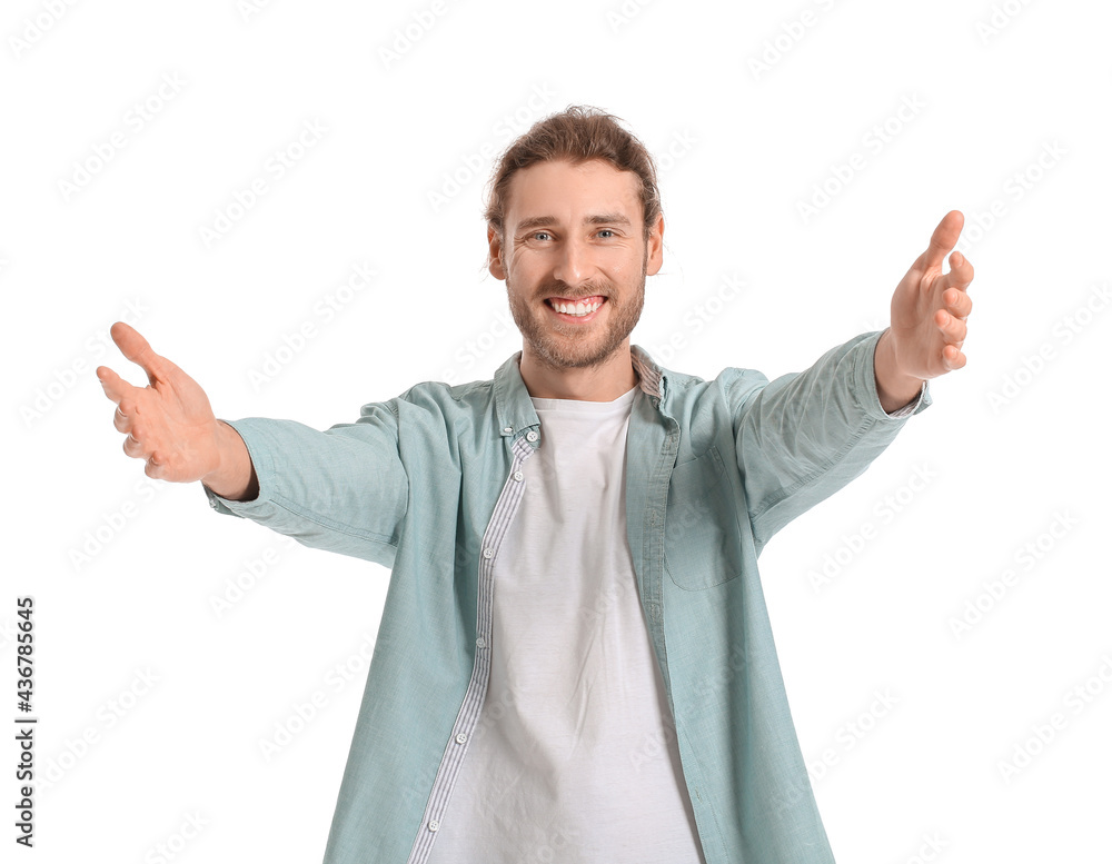 Young man opening arms for hug on white background Young man opening arms for hug on white background