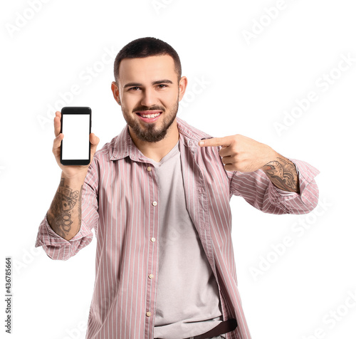 Handsome young man pointing...