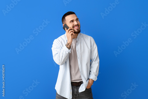 Handsome young man talking ...