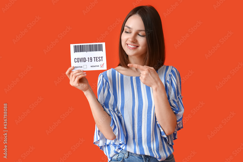 Young woman with negative covid-19 test result on color background Young woman with negative covid-19 test result on color background