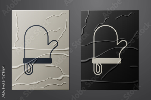 White Oven glove icon isolated on crumpled paper background. Kitchen potholder sign. Cooking glove. Paper art style. Vector