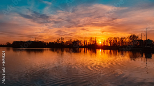 Beautiful sunset with reflections near Plattling, Isar, Bavaria, Germany