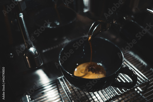 Cup of cappuccino on a wooden table, close up 