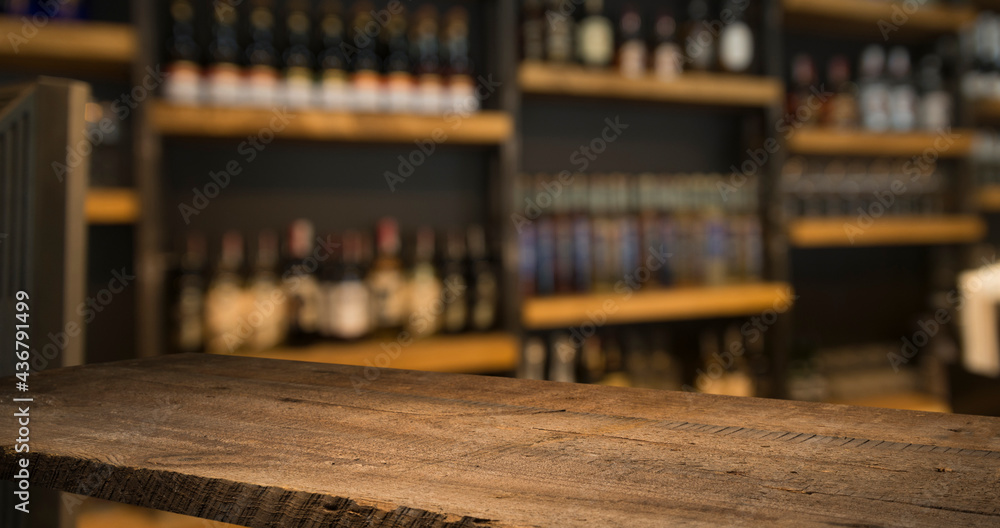 wood table on blur of cafe, coffee shop, bar, background - can used for display or montage your products