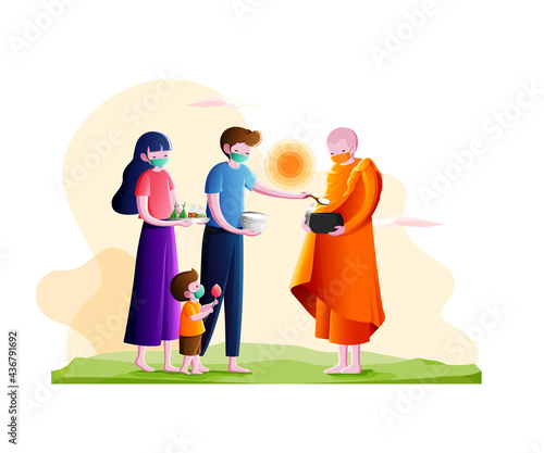 Buddhist monk holding alms bowl to receive food offering from couple and little boy in the morning-Make merit in a new normal concept.