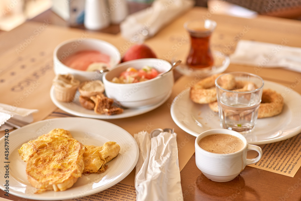 All inclusive breakfast: a large assortment of food for different tastes: turkish tea, coffee omelets, yoghurts and fresh baked goods. Popular type of food service during the holiday season. All inclusive breakfast: a large assortment of food for different tastes: turkish tea, coffee omelets, yoghurts and fresh baked goods. Popular type of food service during the holiday season.
