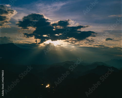 Sunset over the clouds