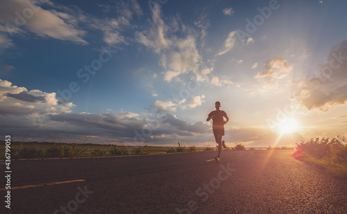 Athlete runner feet running on road, Jogging concept at outdoors. Man running for exercise.