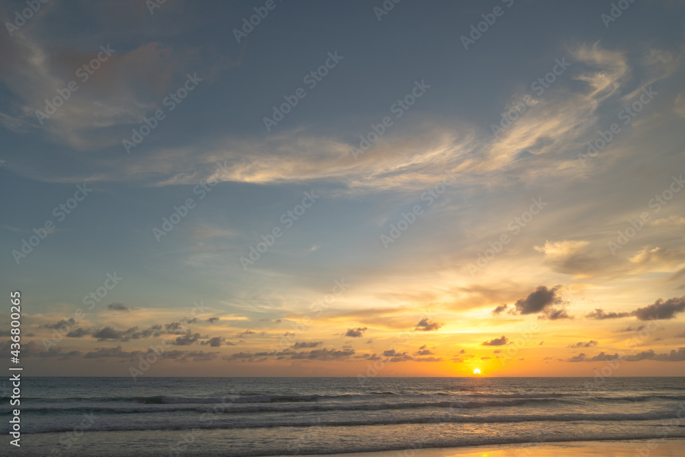 Majestic sunset or sunrise landscape Amazing light of nature cloudscape sky and Clouds moving away rolling .Beautiful Phuket beach is a famous tourist destination in Andaman sea summer. . Majestic sunset or sunrise landscape Amazing light of nature cloudscape sky and Clouds moving away rolling .Beautiful Phuket beach is a famous tourist destination in Andaman sea summer. .