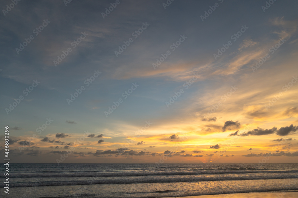 Majestic sunset or sunrise landscape Amazing light of nature cloudscape sky and Clouds moving away rolling .Beautiful Phuket beach is a famous tourist destination in Andaman sea summer. .