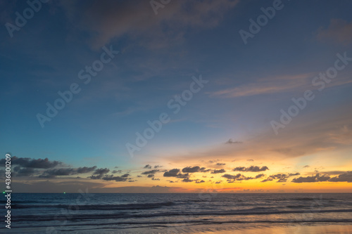 Majestic sunset or sunrise landscape Amazing light of nature cloudscape sky and Clouds moving away rolling .Beautiful Phuket beach is a famous tourist destination in Andaman sea summer. .