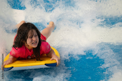 Girl on a boogie board photo