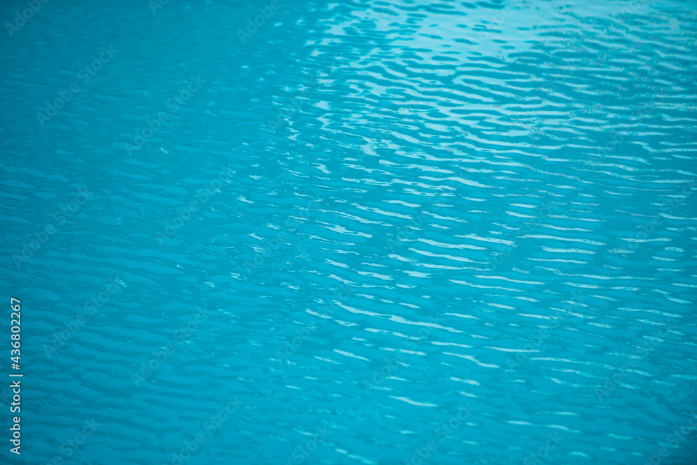 Water in swimming pool, background with high resolution. Wave abstract or rippled water texture. Water in swimming pool, background with high resolution. Wave abstract or rippled water texture.